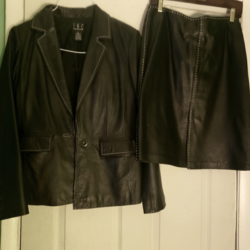 A genuine leather skirt set jacket size 10, skirt size 12 very good condition